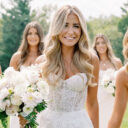 Toronto bridal party hair and makeup by Fancy Face, a bride with her bridesmaids in white on a summer lawn