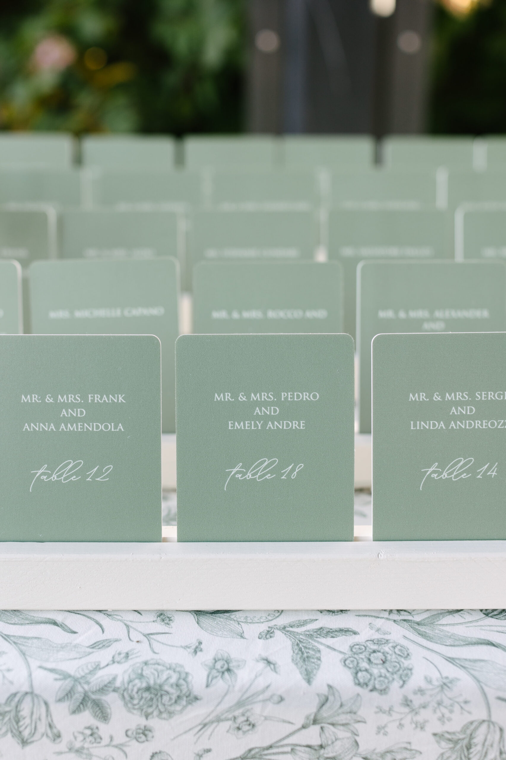 Assignment Card Layout A display of green table assignment cards arranged in neat rows on a ...