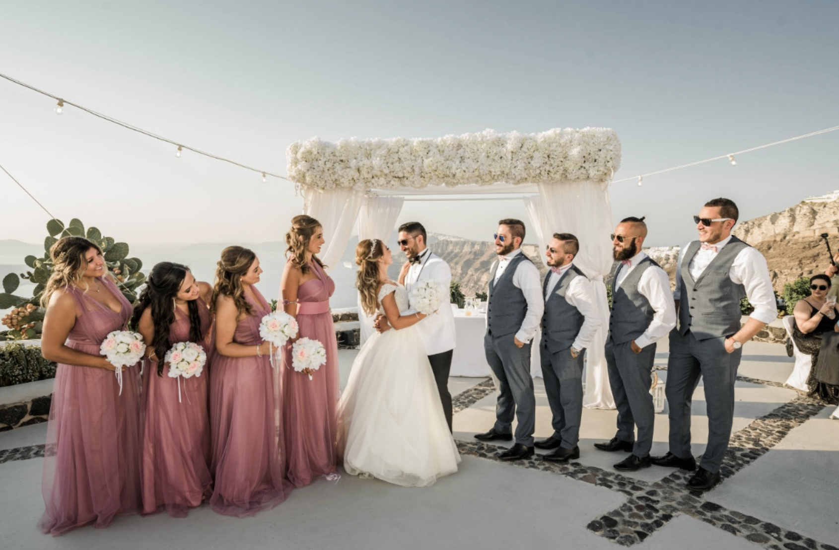 mauve bridesmaid dresses with groomsmen Mauve and Tan Wedding Party