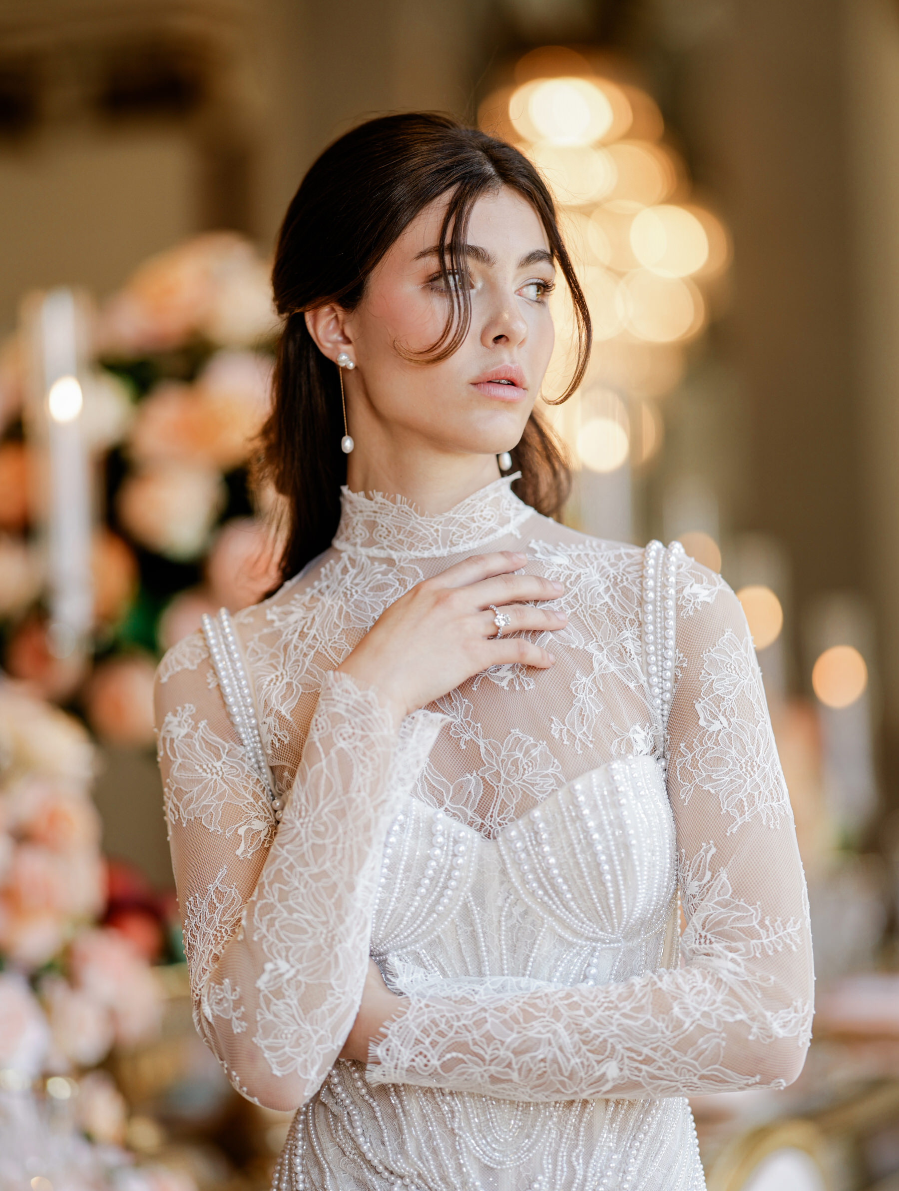 A woman in an elegant, Rococo Revival-inspired lace, high-neck white ...