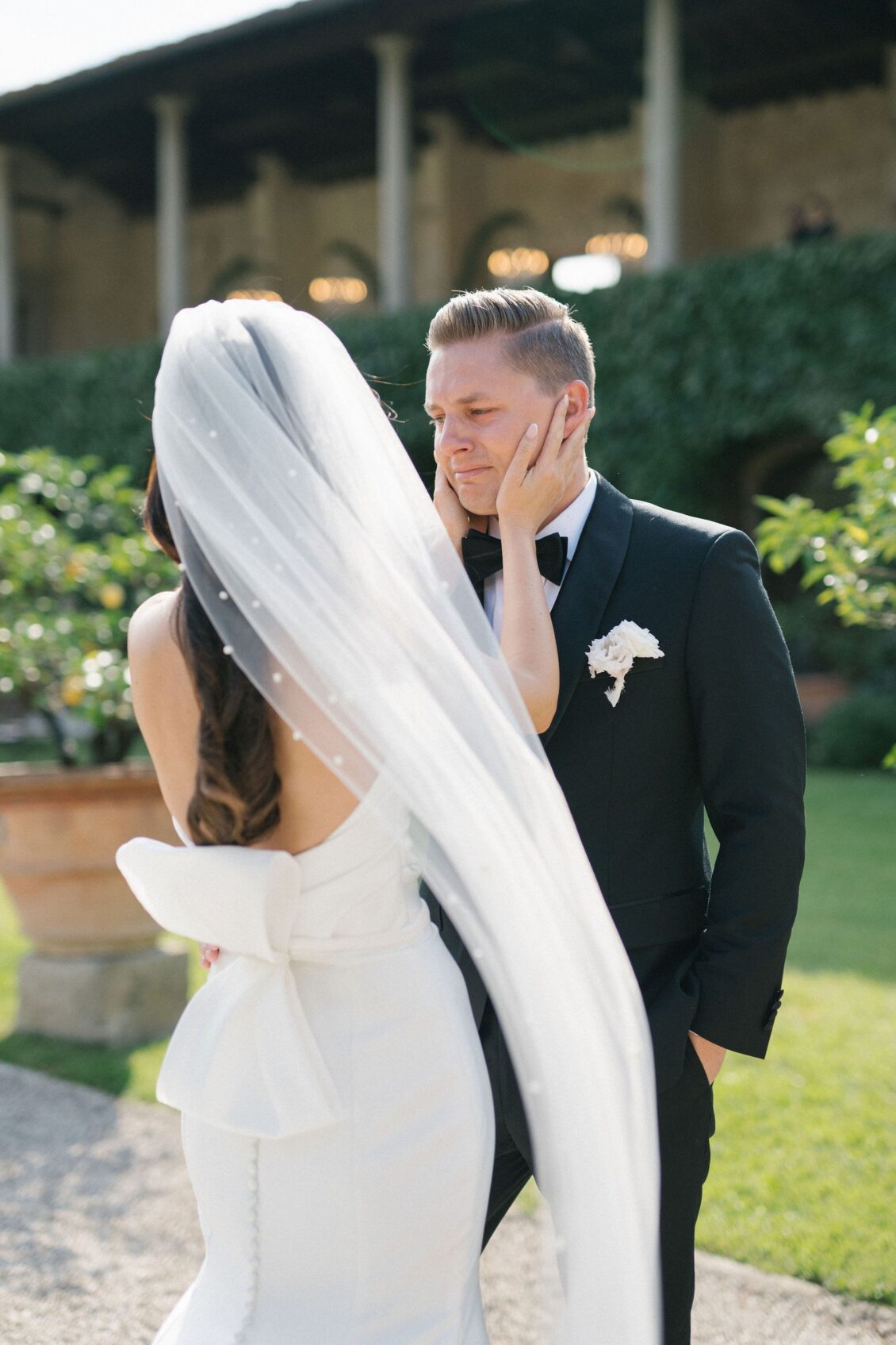Travis seeing Jennifer in her wedding gown in the villa garden