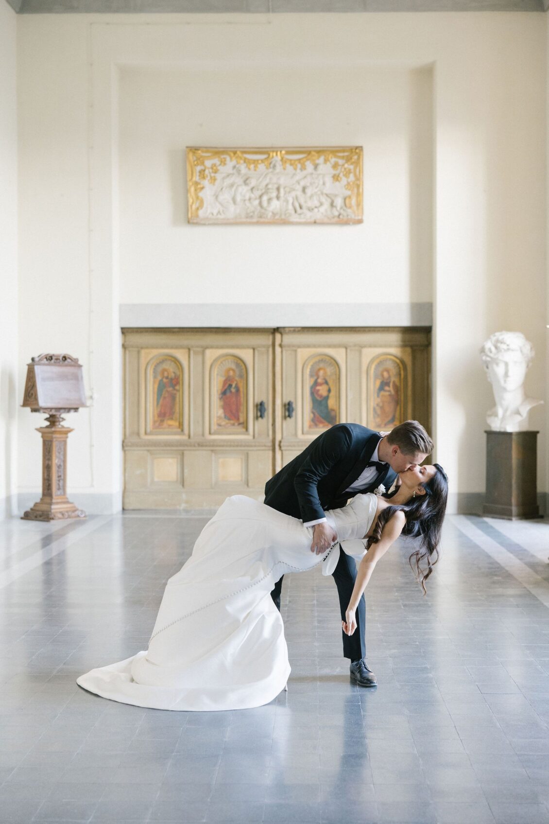 Jennifer and Travis dancing inside the historic Tuscan villa