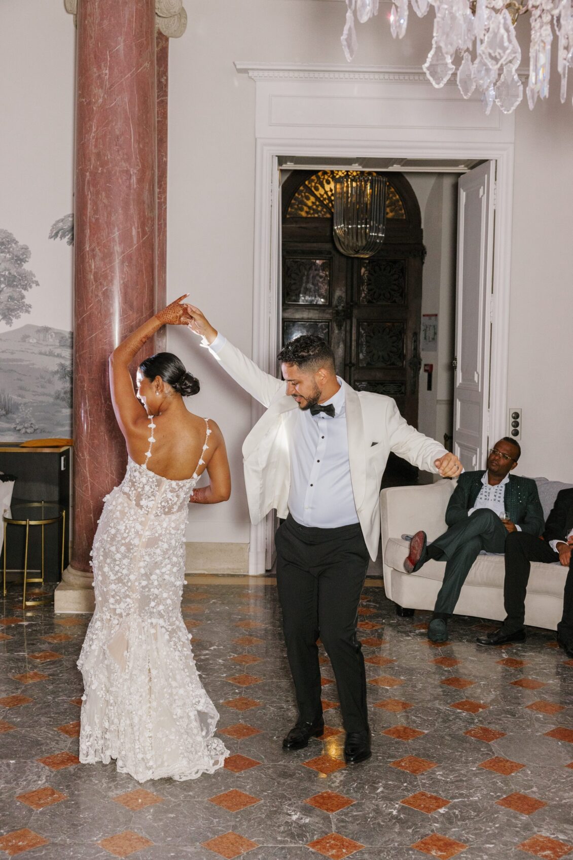 Brittney and Zeus celebrating on the dance floor at Château Martinay
