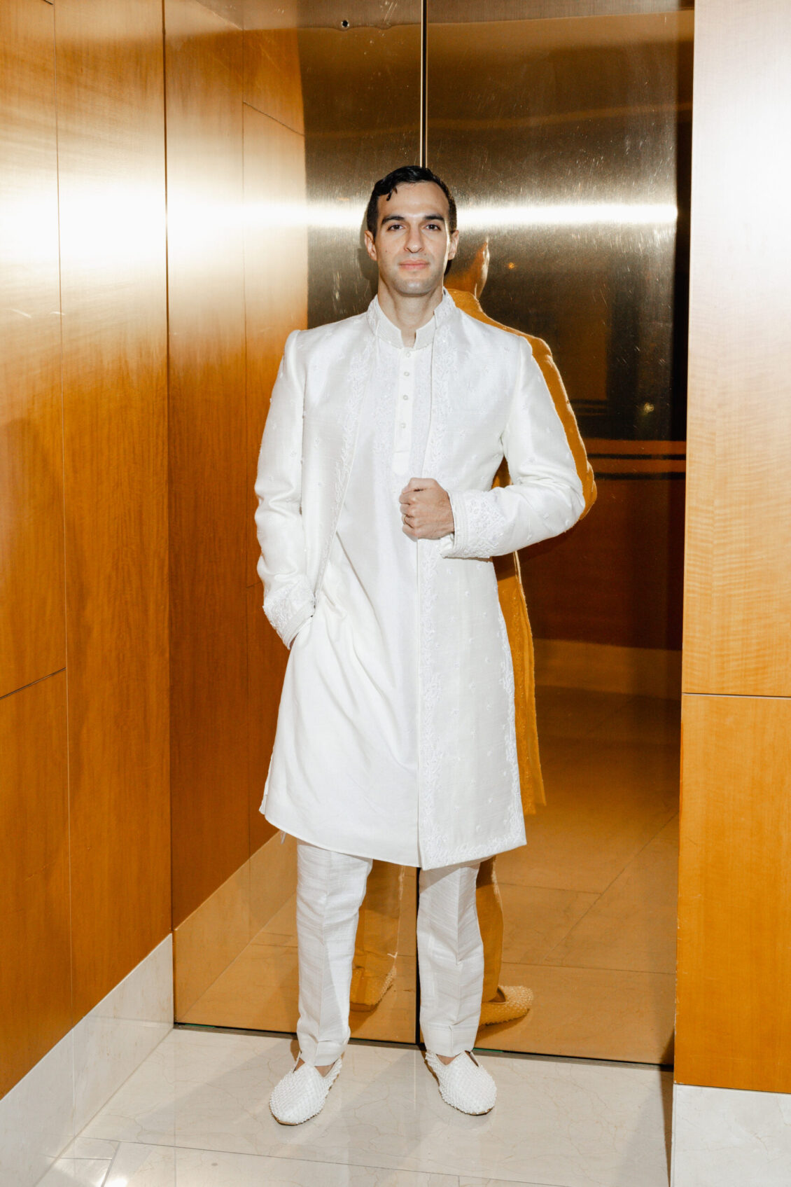 Genie and Stuart's groom preparation and fashion at The Ritz-Carlton, Toronto