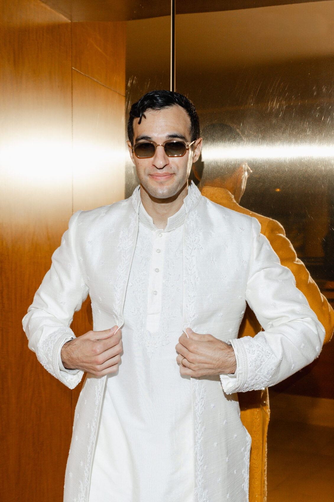 Genie and Stuart's groom preparation and fashion at The Ritz-Carlton, Toronto