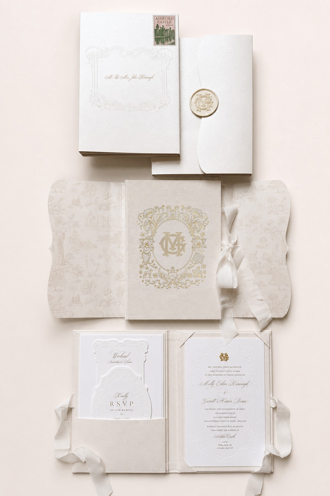 Elegant white and gold wedding invitations with intricate details, a monogram, ribbon ties, and a wax seal are artfully arranged on a light background—capturing the timeless romance of an Irish castle wedding at Ashford Castle.