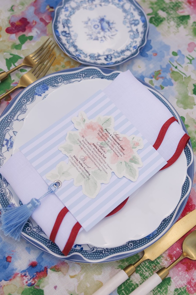 Striped stationery and blue-and-white place setting