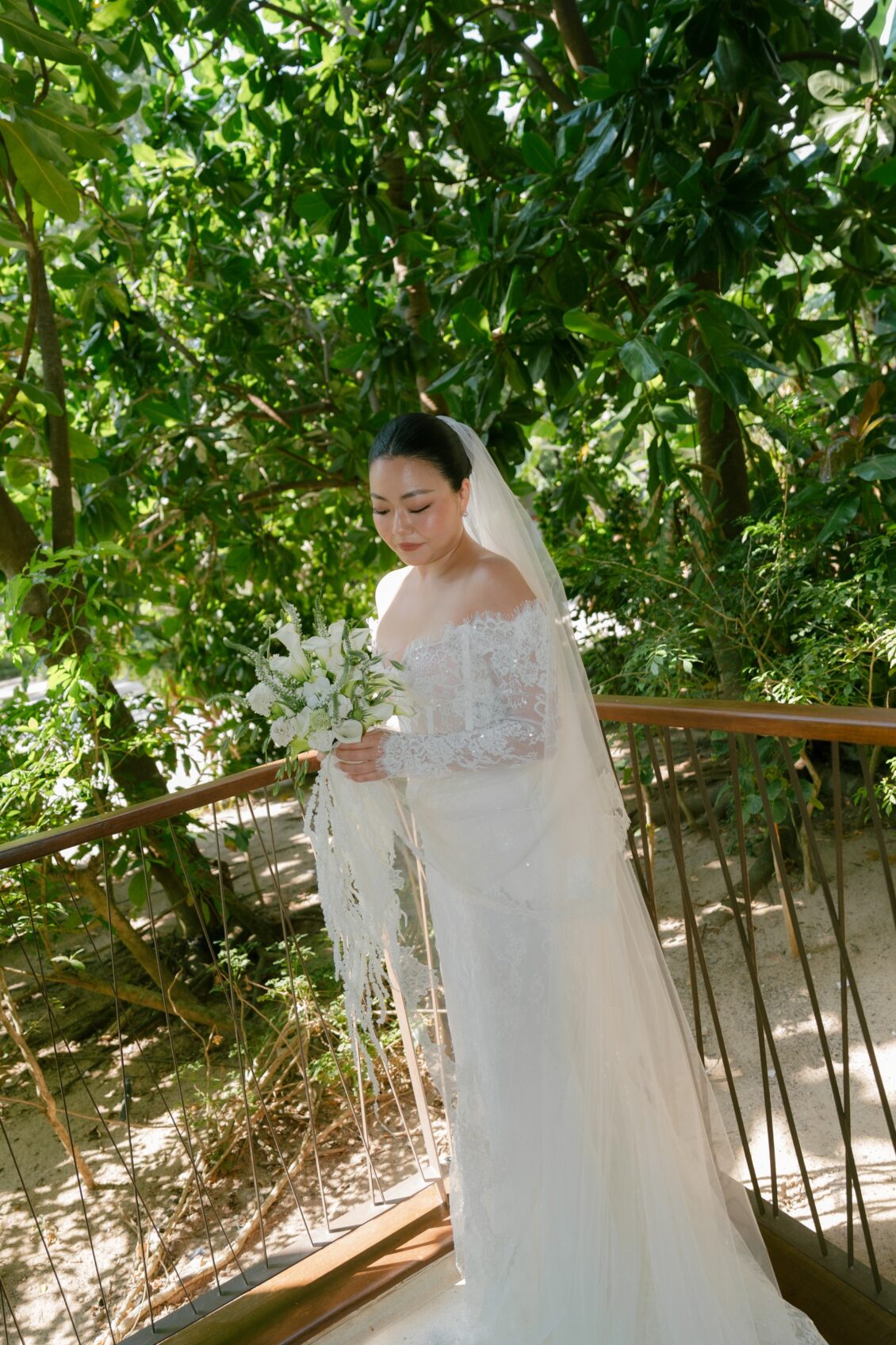 Christine and Shaun's Phuket wedding, full-length finished bridal portrait completes the before-and-after gown progression.