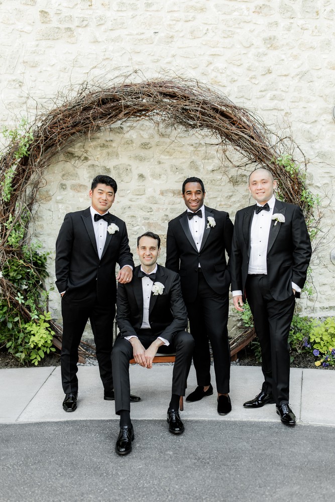 Marta and Eric at Elora Mill — groom and groomsmen portrait — photographed by Rose Vine Studios