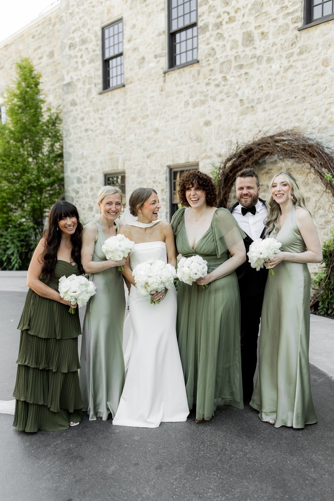 Marta and Eric at Elora Mill — wedding party portrait — photographed by Rose Vine Studios