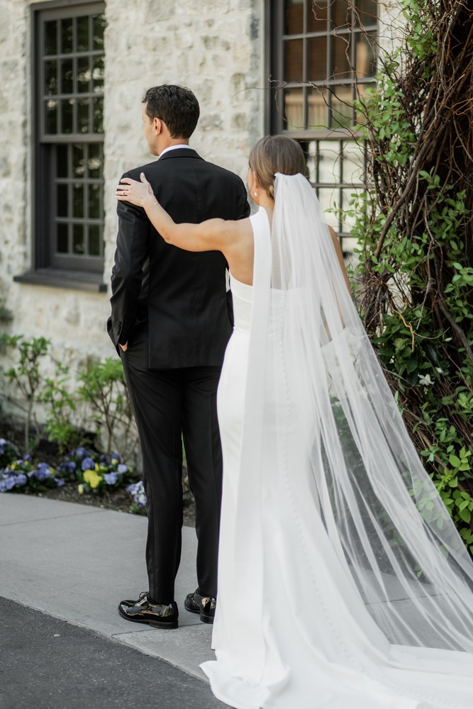 Marta and Eric at Elora Mill — first look anticipation — photographed by Rose Vine Studios