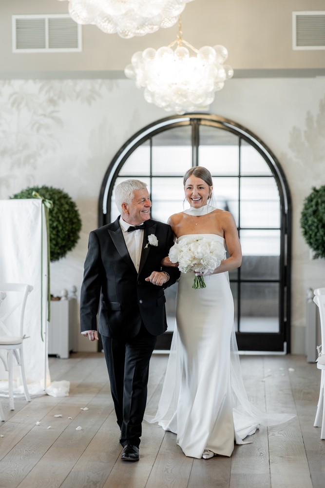 Marta and Eric at Elora Mill — bride ceremony entrance — photographed by Rose Vine Studios