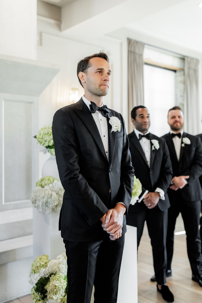Marta and Eric at Elora Mill — groom ceremony reaction — photographed by Rose Vine Studios