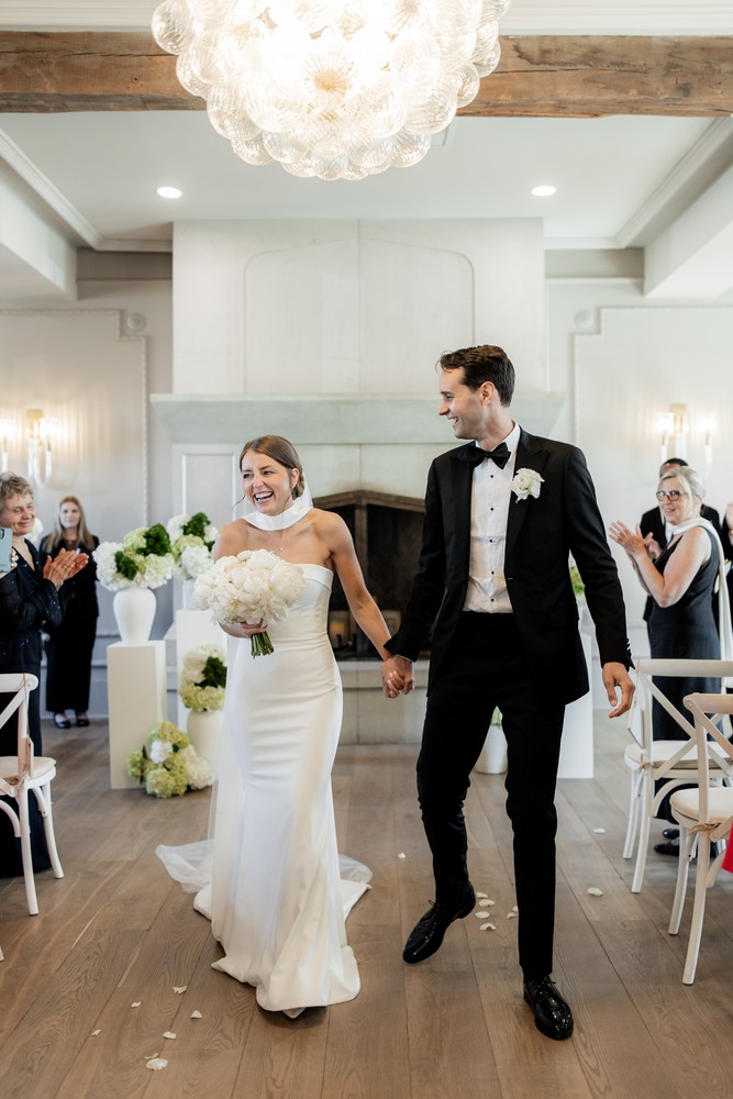 Marta and Eric at Elora Mill — newlyweds recessional — photographed by Rose Vine Studios