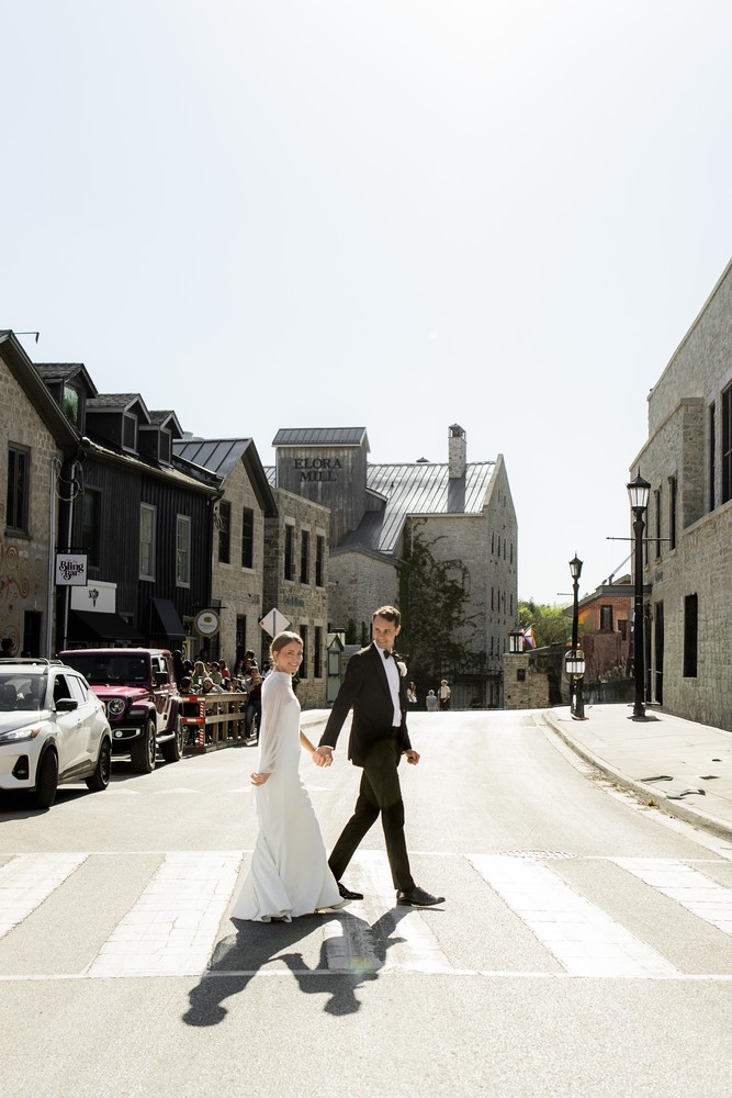 Marta and Eric at Elora Mill — couple elora street portrait — photographed by Rose Vine Studios