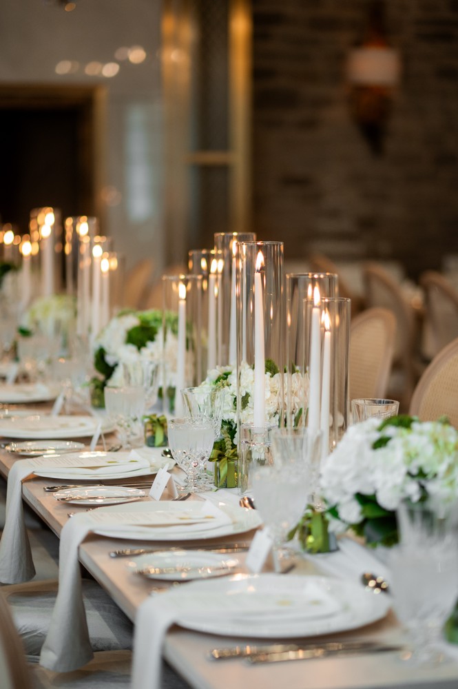 Marta and Eric at Elora Mill — candlelit reception table — photographed by Rose Vine Studios
