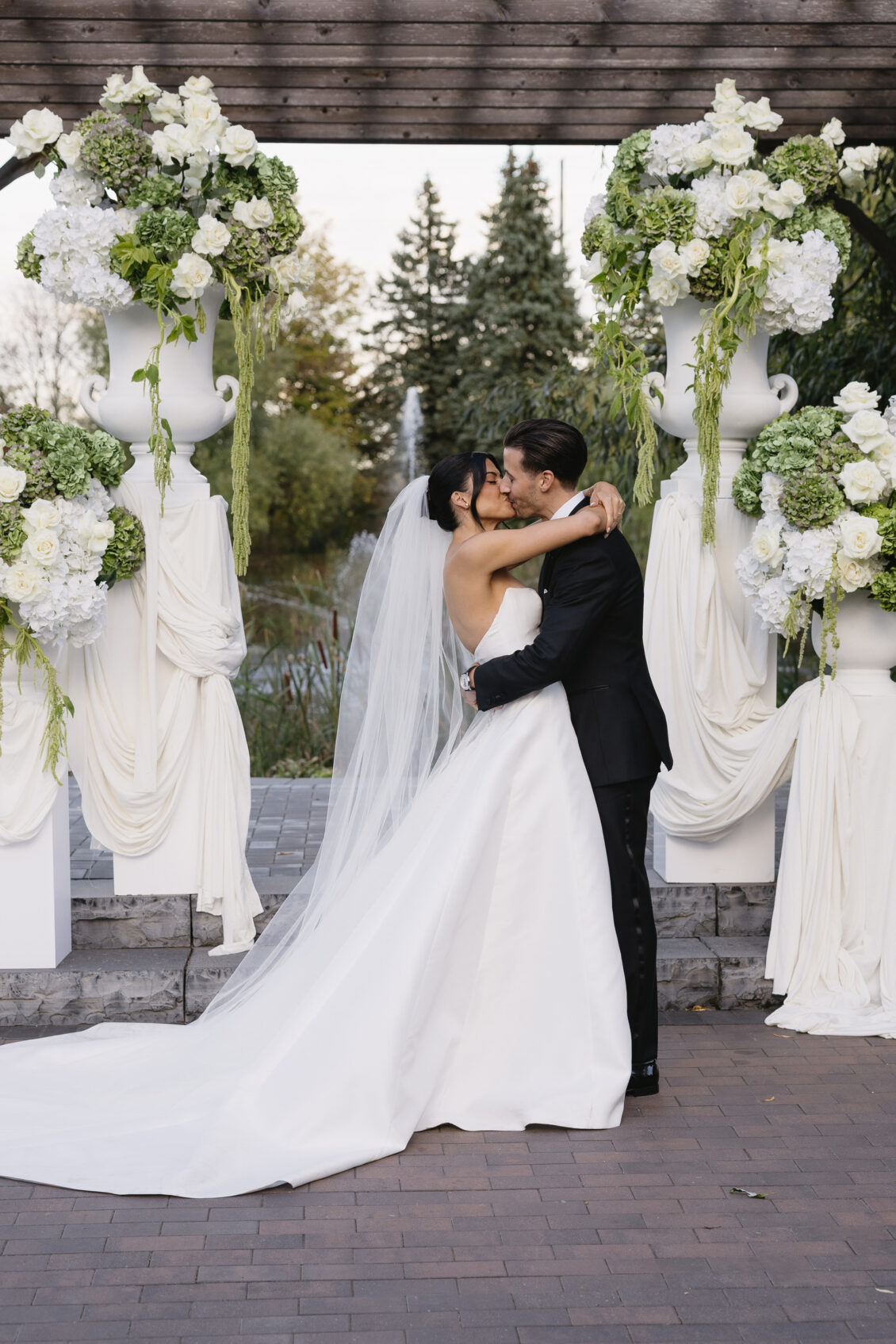 Erica and Anthony kiss after their ceremony.
