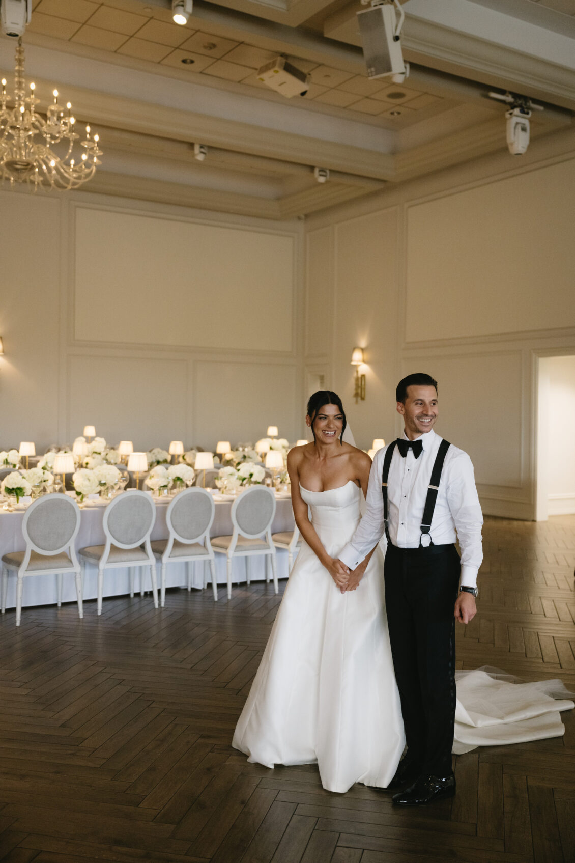 Erica and Anthony pose in the supper-club reception setting.