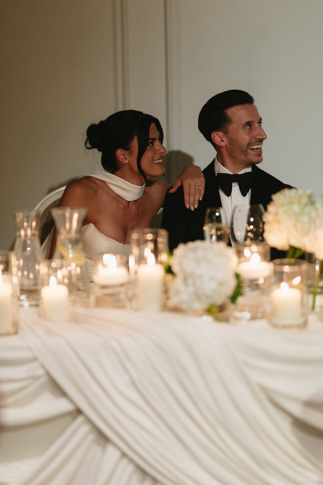 Erica and Anthony share a moment during dinner.