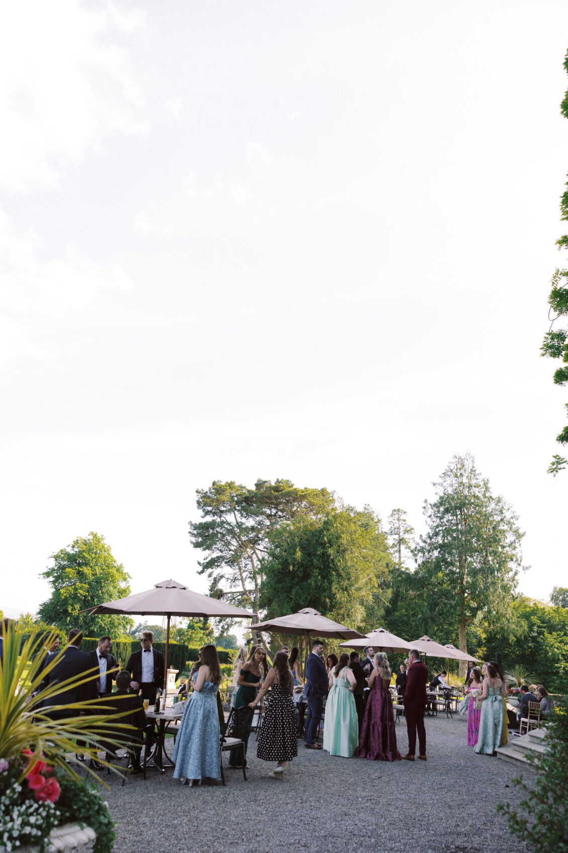 Guests at an outdoor reception on the estate at Luttrellstown Castle Resort