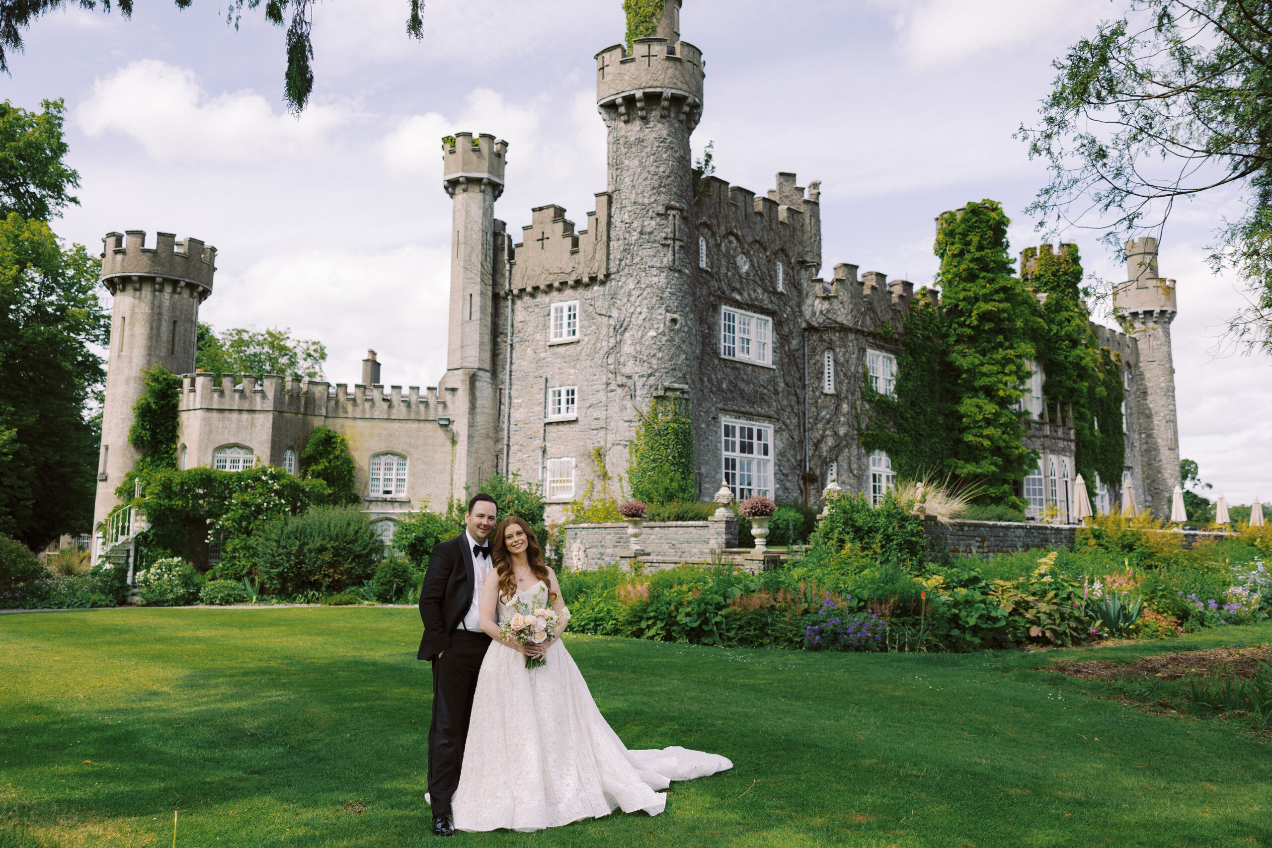 Newlyweds before Luttrellstown Castle Resort near Dublin, Ireland