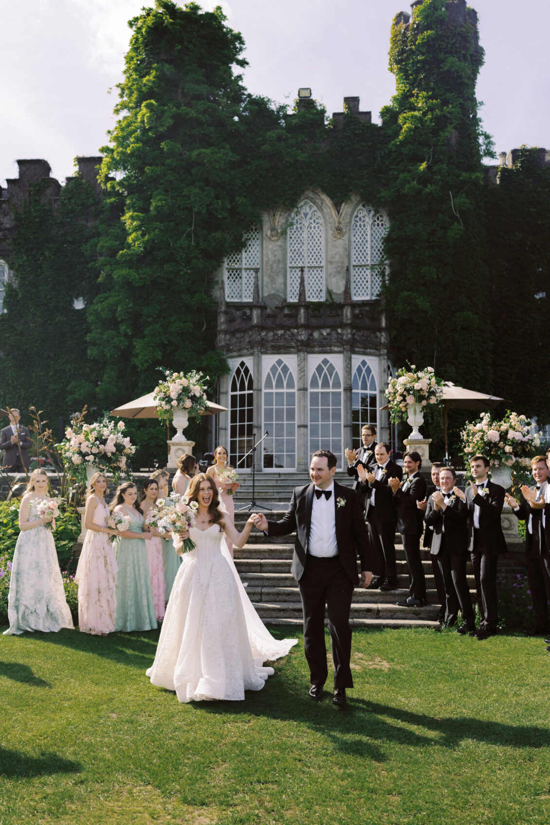 Newlyweds and their wedding party in the gardens at Luttrellstown Castle Resort