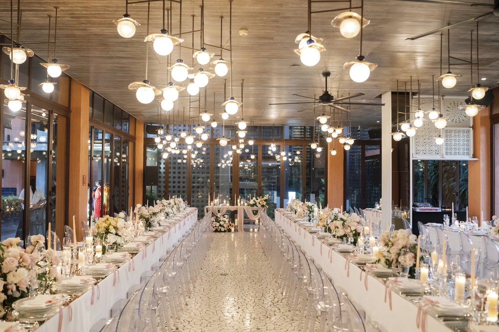 Vivian and Josen’s romantic destination wedding at Trisara Phuket — symmetrical wide dining-room view